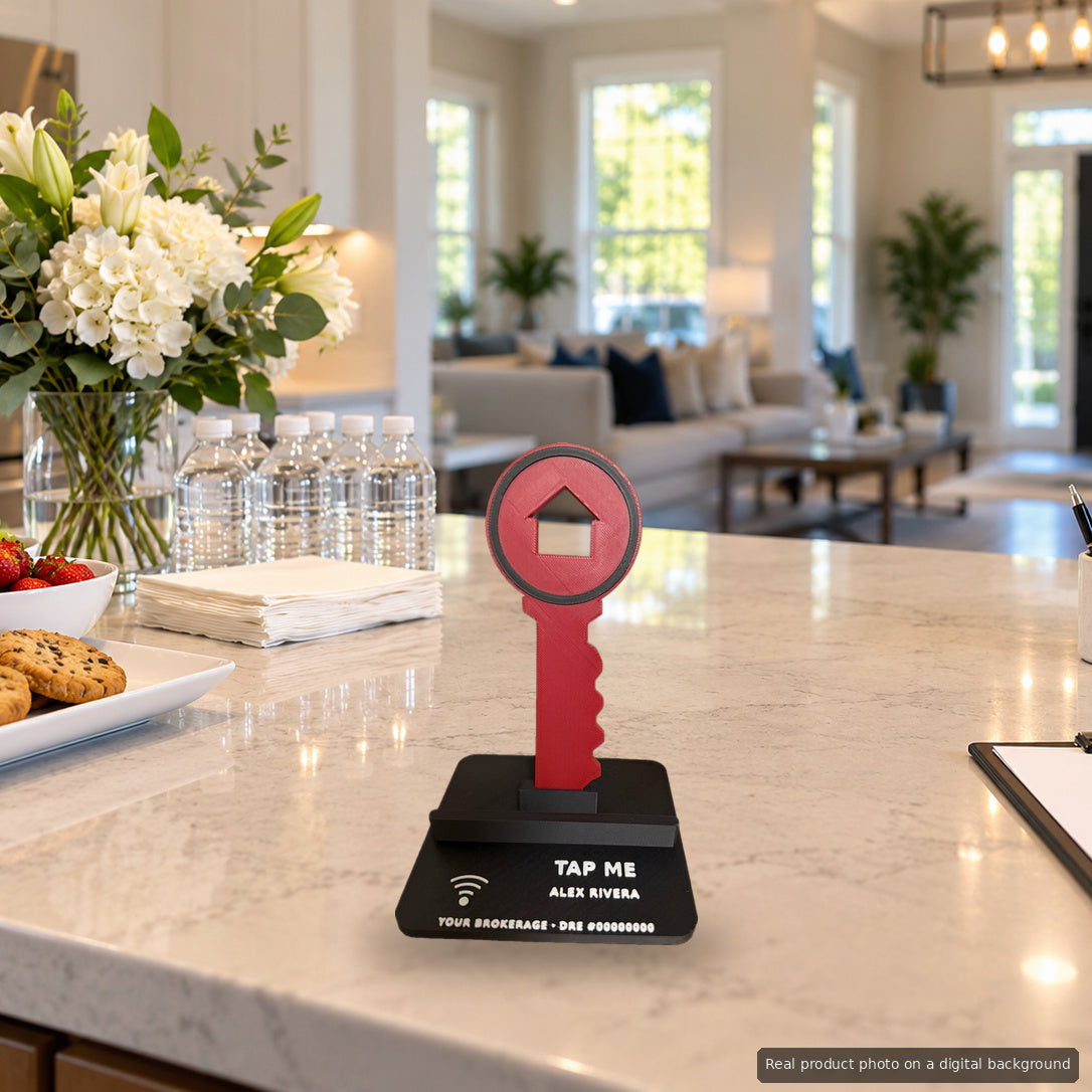 Key Phone Stand on an open house kitchen island with snacks and a sign-in sheet (real product photo on a digital background)