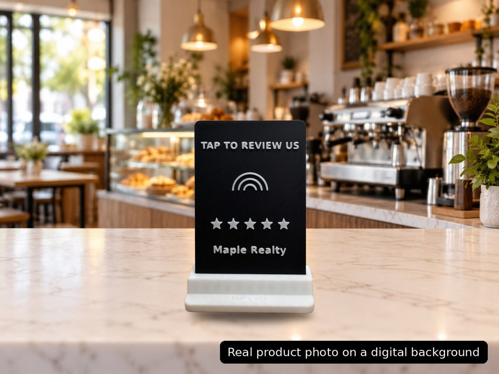 Real photo of the Tap-to-Review counter stand on a cafe counter (background added digitally)