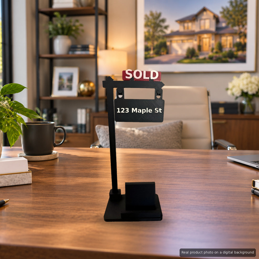 SOLD Sign Phone Stand on a realtor's office desk (real product photo on a digital background)