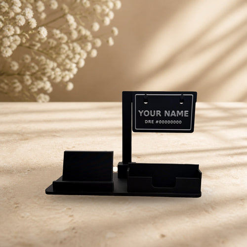 Card sign desk set on a cream stone surface (real product photo on a styled background)